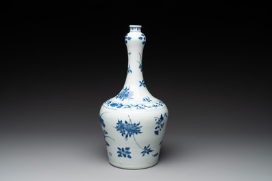 A Chinese blue and white bottle vase with floral sprigs, Transitional period