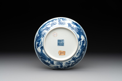 An imperial Chinese blue and white 'dragon' plate, Qianlong mark and of the period