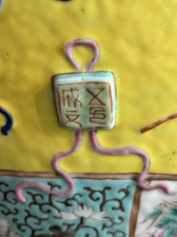 A Chinese famille rose yellow-ground relief-molded 'antiquities' fish bowl, Zhengde mark, 19th C.
