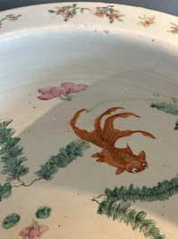 A Chinese famille rose yellow-ground relief-molded 'antiquities' fish bowl, Zhengde mark, 19th C.