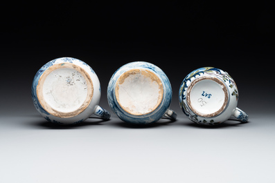 Two blue and white and one polychrome Dutch Delft puzzle jugs, dated 1734 and 1705, 18th C. and later