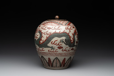 A Chinese Swatow green- and red-enamelled 'dragon' jar and a pair of covered bowls, Ming