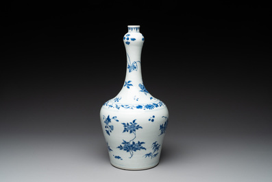 A Chinese blue and white bottle vase with floral sprigs, Transitional period