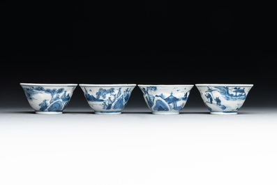 Four Chinese blue and white 'landscape' cups and saucers, Kangxi