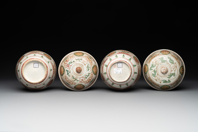 A Chinese Swatow green- and red-enamelled 'dragon' jar and a pair of covered bowls, Ming