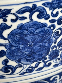 A large Chinese blue and white 'flower scroll' vase, Qianlong mark, 19th C.