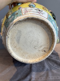 A Chinese famille rose yellow-ground relief-molded 'antiquities' fish bowl, Zhengde mark, 19th C.
