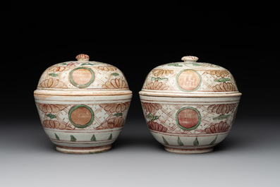 A Chinese Swatow green- and red-enamelled 'dragon' jar and a pair of covered bowls, Ming