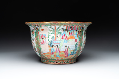 A Chinese Canton famille rose jardini&egrave;re and stand with court scenes, 19th C.
