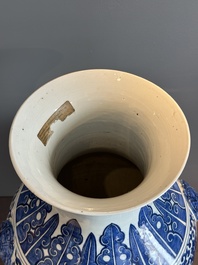 A large Chinese blue and white 'flower scroll' vase, Qianlong mark, 19th C.