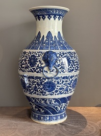 A large Chinese blue and white 'flower scroll' vase, Qianlong mark, 19th C.