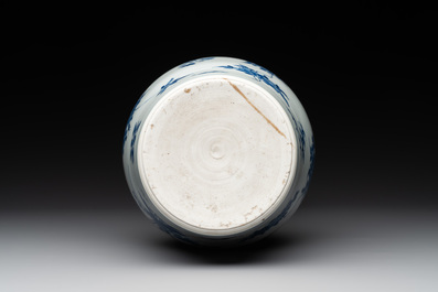 A Chinese blue and white bottle vase with floral sprigs, Transitional period