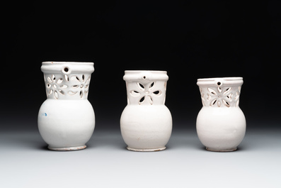 Three French white-glazed and two polychrome puzzle jugs, Nevers, 18th C.