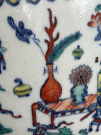 A Chinese doucai 'antiquities' 'hu' vase, Qianlong mark, 19th C.