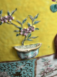 A Chinese famille rose yellow-ground relief-molded 'antiquities' fish bowl, Zhengde mark, 19th C.