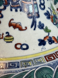 A Chinese doucai 'antiquities' 'hu' vase, Qianlong mark, 19th C.