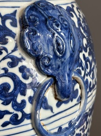 A large Chinese blue and white 'flower scroll' vase, Qianlong mark, 19th C.