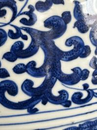 A large Chinese blue and white 'flower scroll' vase, Qianlong mark, 19th C.
