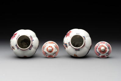 A pair of Chinese famille rose 'antiquities' tea caddies and covers, Yongzheng/Qianlong