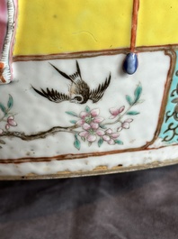 A Chinese famille rose yellow-ground relief-molded 'antiquities' fish bowl, Zhengde mark, 19th C.