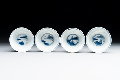 Four Chinese blue and white 'landscape' cups and saucers, Kangxi