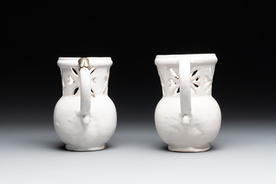Three French white-glazed and two polychrome puzzle jugs, Nevers, 18th C.