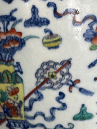 A Chinese doucai 'antiquities' 'hu' vase, Qianlong mark, 19th C.