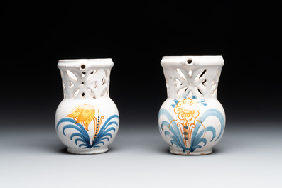 Three French white-glazed and two polychrome puzzle jugs, Nevers, 18th C.