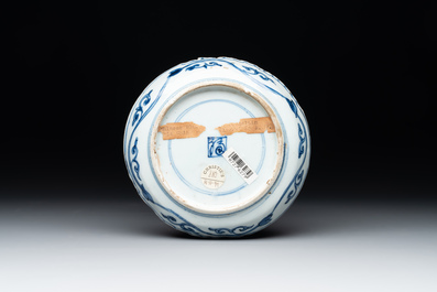 A Chinese blue and white shonzui ko-sometsuke dish with birds and calligraphy for the Japanese market, Fu 福 mark, Ming, 17th C.