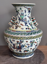 A Chinese doucai 'antiquities' 'hu' vase, Qianlong mark, 19th C.