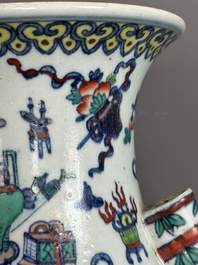 A Chinese doucai 'antiquities' 'hu' vase, Qianlong mark, 19th C.