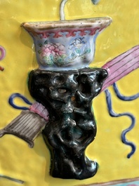 A Chinese famille rose yellow-ground relief-molded 'antiquities' fish bowl, Zhengde mark, 19th C.