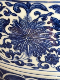 A large Chinese blue and white 'flower scroll' vase, Qianlong mark, 19th C.