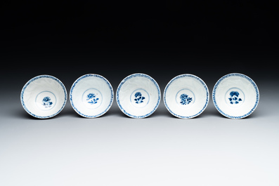 Five Chinese blue and white cups and saucers with floral design, Yu 玉 mark, Kangxi