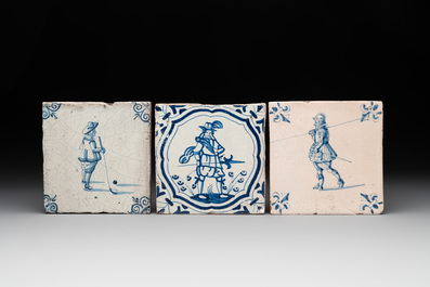 Six blue and white Dutch Delft tiles with large figures, 17th C.