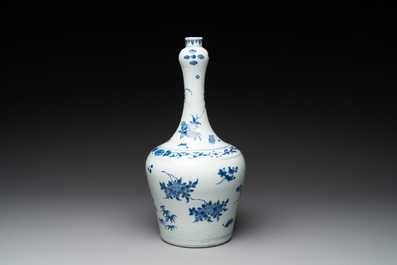 A Chinese blue and white bottle vase with floral sprigs, Transitional period