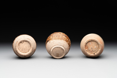 A collection of 11 Chinese and South-East Asian monochrome wares, 15th C. and later