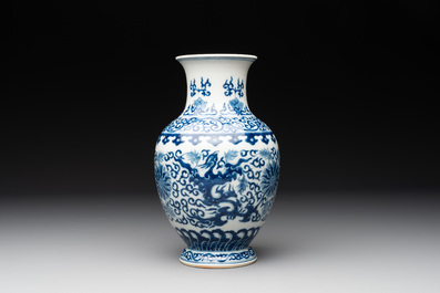 A Chinese blue and white 'phoenix and flower scroll' vase, Qianlong mark, 19th C.