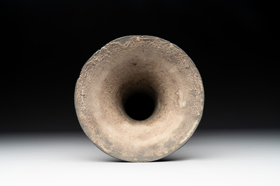 A Chinese archaistic bronze 'gu' vase with relief design, Ming
