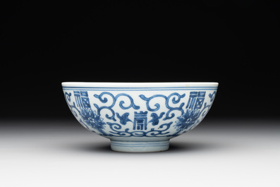 A Chinese blue and white 'fu and shou' bowl with flower scrolls, Yongzheng mark and of the period