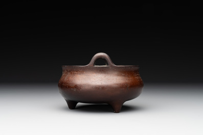 A Chinese bronze tripod censer, Xuande mark, Ming