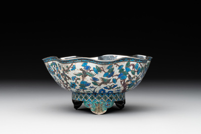 A Chinese enamelled silver bowl, a box and an opium container, 19th C.