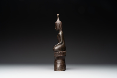 A Burmese bronze figure of a seated Buddha, 18/19th C.