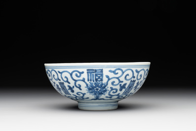 A Chinese blue and white 'fu and shou' bowl with flower scrolls, Yongzheng mark and of the period