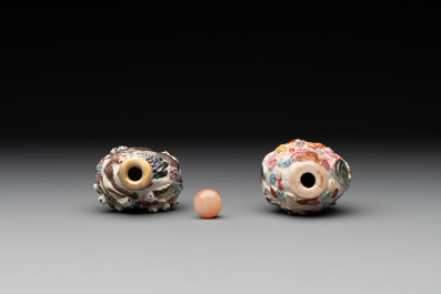 Two Chinese famille rose molded snuff bottles with figural design, Qianlong mark, 19th C.