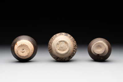 A collection of 11 Chinese and South-East Asian monochrome wares, 15th C. and later