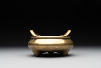 A Chinese bronze tripod censer on a wooden stand, Song Zhu Xuan 松竹軒 mark, 18th C.