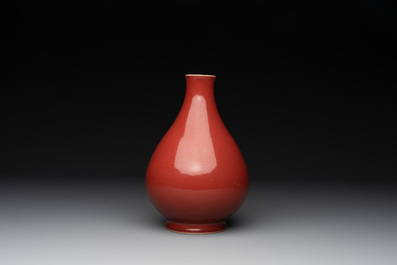 A Chinese copper-red-glazed pear-shaped vase, Yongzheng mark and of the period