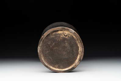 A Chinese archaistic bronze 'gu' vase with relief design, Ming