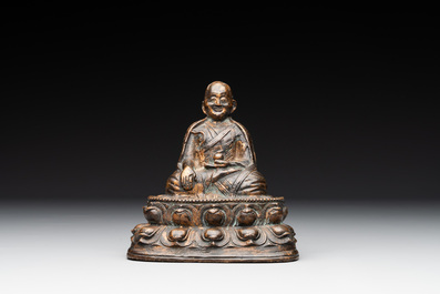 A Tibetan bronze Padmasambhava, 14th C.